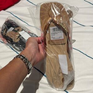 Brand new Havaianas sandals-3 pair in size 7. White $30 /gold $35/ black $30